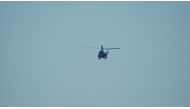 A Hellenic Air Force helicopter departs Chios Airport en route to Greek island Samos for a search and rescue mission after a helicopter fighting a forest fire crashed in the sea, Greece in this picture obtained from social media July 13, 2022. Twitter @AegeanHawk/via REUTERS THIS IMAGE HAS BEEN SUPPLIED BY A THIRD PARTY. MANDATORY CREDIT. NO RESALES. NO ARCHIVES.