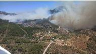 Smoke rises from a wildfire in Datca in Mugla province, Turkey July 13, 2022. Mugla Regional Forestry Directorate/Handout via REUTERS