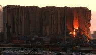 A view shows fire in Beirut grain silos damaged in the August 2020 port blast in Beirut, Lebanon, July 13, 2022. (REUTERS/Emilie Madi)