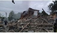 Emergency crew work amidst collapsed building site in Chuhuiv Town, Kharkiv, Ukraine, in this handout image obtained by REUTERS on July 16, 2022. State Emergency Service of Ukraine/Handout via REUTERS


