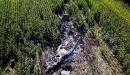 Debris is seen at the crash site of an Antonov An-12 cargo plane owned by a Ukrainian company, near Kavala, Greece, July 17, 2022. REUTERS/Alkis Konstantinidis