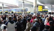 Passengers queue inside the departures terminal of Terminal 2 at Heathrow Airport in London, Britain, June 27, 2022. REUTERS/Henry Nicholls


