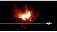 A drone view shows the burning debris at the crash site of an Antonov An-12 cargo plane owned by a Ukrainian company, near Kavala, Greece, July 16, 2022. ENA Channel/Handout via REUTERS ATTENTION EDITORS- THIS IMAGE HAS BEEN SUPPLIED BY A THIRD PARTY. MANDATORY CREDIT NO RESALES. NO ARCHIVES. MUST NOT OBSCURE LOGO
