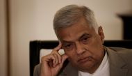 Sri Lanka's Prime Minister Ranil Wickremesinghe gestures as he speaks during an interview with Reuters at his office in Colombo, Sri Lanka, May 24, 2022. REUTERS/Adnan Abidi/File Photo