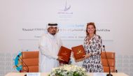 Executive Director of Aman Centre Abdulaziz Al Ishaq and CEO of Child Focus Heidi De Pauw during the signing of the agreement. 
