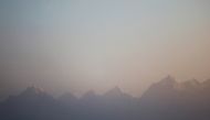 Mount Everest, the world highest peak, and other peaks of the Himalayan range are seen during the sunrise from Ratnange hill in Solukhumbu, Nepal March 27, 2022. REUTERS/Navesh Chitrakar/File Photo