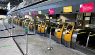 Empty counters of German airline Lufthansa at Frankfurt Airport are pictured during a strike of security staff at various German airports, March 15, 2022. (REUTERS/Timm Reichert/File Photo)