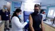Tareco Timothy receives a monkeypox vaccination at the Northwell Health Immediate Care Center at Fire Island-Cherry Grove, in New York, US, July 15, 2022. (REUTERS/Eduardo Munoz)