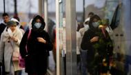 File Photo: People wearing face masks walk in Nantes amid the coronavirus disease (COVID-19) outbreak in France, December 9, 2021. (REUTERS/Stephane Mahe)