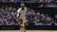 Jul 10, 2022; London, United Kingdom; Nick Kyrgios (AUS) returns a shot during the men’s final against Novak Djokovic (not pictured) on day 14 at All England Lawn Tennis and Croquet Club. Mandatory Credit: Susan Mullane-USA TODAY Sports/File Photo