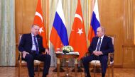 Russian President Vladimir Putin listens to Turkish President Tayyip Erdogan during a meeting in Sochi, Russia, on August 5, 2022. (Sputnik/Vyacheslav Prokofyev/Pool via REUTERS)