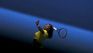 Serena Williams of the U.S. serves during her first round match against Italy's Camila Giorgi at the Australian Open tennis tournament at Melbourne Park, Australia, January 18, 2016. REUTERS/Jason O'Brien/File Photo