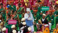 Indian Prime Minister Narendra Modi meets with folk artists after addressing the nation during Independence Day celebrations at the historic Red Fort in Delhi, India, August 15, 2022. (REUTERS/Adnan Abidi)