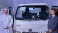 Ali Mohamed Al Kuwari, Vice-President - Marine and Industrial Equipment at Milaha and Satoshi Matsumoto, Managing Director at Hino Motors Middle East, during the launch ceremony, in Doha, recently. 