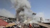 Smoke rises after blasts ripped through a fireworks warehouse in a shopping mall in Yerevan, Armenia August 14, 2022. Hayk Baghdasaryan/Photolure via REUTERS

