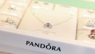 Pandora products are seen at their store at the Woodbury Common Premium Outlets in Central Valley, New York, U.S., February 15, 2022. REUTERS/Andrew Kelly/File Photo