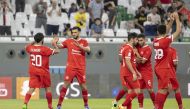 Al Arabi players celebrate during the match against Al Markhiya.  