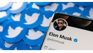 Elon Musk's Twitter profile is seen on a smartphone placed on printed Twitter logos in this picture illustration taken on April 28, 2022. File Photo / Reuters