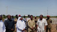Officials inspecting flood-ravaged areas in Sudan.