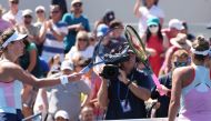 Victoria Azarenka (left) greets Marta Kostyuk of Ukraine after their second round match on day four of the 2022 US Open tennis tournament at USTA Billie Jean King Tennis Center at Flushing, New York, on September 1, 2022.   Mandatory Credit: Jerry Lai-USA TODAY Sports