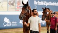 Riders during vet check ahead of the opening round of the sixth edition of Qatar Equestrian Tour - Longines Hathab. 