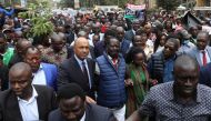 Kenya's opposition leader and presidential candidate Raila Odinga, of the Azimio La Umoja (Declaration of Unity) One Kenya Alliance, walks on the day of filling a petition challenging the presidential election result, in Nairobi, Kenya, on August 22, 2022. REUTERS/Baz Ratner