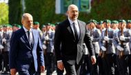 German Chancellor Olaf Scholz welcomes Ukrainian Prime Minister Denys Shmyhal during a military honour ceremony in the courtyard of the Chancellery, in Berlin, Germany, September 4, 2022. REUTERS/Christian Mang


