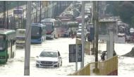 People commute along water-logged roads following torrential rains in Bengaluru, India September 6, 2022. ANI/Reuters TV via REUTERS