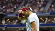 Rafael Nadal of Spain wipes sweat from his forehead during a match against Frances Tiafoe of the United States on day eight of the 2022 US Open tennis tournament at USTA Billie Jean King Tennis Center. Danielle Parhizkaran-USA TODAY Sports