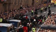 The hearse carrying the coffin of Britain's Queen Elizabeth travels in Edinburgh, Scotland, on September 12, 2022. REUTERS/Lee Smith