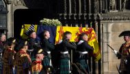 The late Queen Elizabeth II's coffin is carried from St Giles Church in Edinburgh, Scotland, on September 13, 2022. Ian Forsyth/Pool via REUTERS
