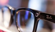 File Photo: A Ray-Ban sunglass frame is pictured for sale in a Sunglass Hut, both brands owned by EssilorLuxottica SA, in Manhattan, New York City, US, on November 30, 2021. (REUTERS/Andrew Kelly)