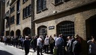 People queue near Bermondsey to pay their respects, following the death of Britain's Queen Elizabeth in London on September 15, 2022. REUTERS/Henry Nicholls