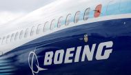 The Boeing logo is seen on the side of a Boeing 737 MAX at the Farnborough International Airshow, in Farnborough, Britain, on July 20, 2022. (REUTERS/Peter Cziborra)
