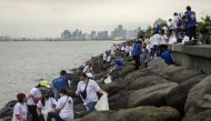 Volunteers pick up trash along the shore of Manila Bay on International Coastal Cleanup Day in Pasay City, Philippines, September 17, 2022. Reuters/Eloisa Lopez
 