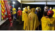 Firefighters work at the scene of a deadly bus accident, where a landslide reportedly hit the vehicle, throwing it off a cliff, in Cambronero, Alajuela Province, Costa Rica in this social media handout image released September 17, 2022. Benemerito Cuerpo De Bomberos De Costa Rica/Handout via REUTERS