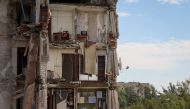 A damaged apartment house is seen, as Russia's attack on Ukraine continues, in the town of Izium, recently liberated by Ukrainian Armed Forces, in Kharkiv region, Ukraine September 17, 2022. REUTERS/Gleb Garanich