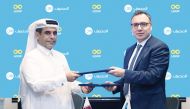 Dinos Constantinides, QIB’s Chief Strategy & Digital Officer and Loop’s Owner Ibrahim Mohd A H Al Mohannadi, during the signing ceremony, recently. 