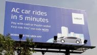 A billboard of ride-hailing service Uber is pictured on a highway in New Delhi, India, April 19, 2016. REUTERS/Anindito Mukherjee/File Photo
