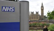 A National Health Service (NHS) sign is seen in the grounds of St Thomas' Hospital, in front of the Houses of Parliament, in London on June 7, 2011. File Photo / Reuters



