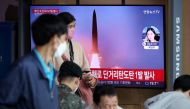 People watch a TV broadcasting a news report on North Korea firing a ballistic missile towards the sea off its east coast, in Seoul, South Korea, September 25, 2022. Reuters/Kim Hong-Ji