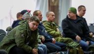 Russian reservists meet at a gathering point in the course of partial mobilization of troops, aimed to support the country's military campaign in Ukraine, in the town of Volzhsky in the Volgograd region, Russia, on September 28, 2022. REUTERS/Stringer