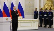 Russian President Vladimir Putin attends a ceremony to declare the annexation of the Russian-controlled territories of four Ukraine's Donetsk, Luhansk, Kherson and Zaporizhzhia regions, after holding what Russian authorities called referendums in the occupied areas of Ukraine that were condemned by Kyiv and governments worldwide, in the Georgievsky Hall of the Great Kremlin Palace in Moscow, Russia, on September 30, 2022. (Sputnik/Mikhail Metzel via REUTERS)