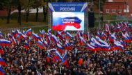 People attend a concert marking the declared annexation of the Russian-controlled territories of four Ukraine's Donetsk, Luhansk, Kherson and Zaporizhzhia regions, near Red Square in central Moscow, Russia, on September 30, 2022. (REUTERS)