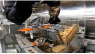 The Flippy 2 robot takes fries out of a vat of oil at a lab of manufacturer Miso Robotics Inc in Pasadena, California, U.S. September 27, 2022, in this screen grab from a REUTERS video. Sandra Stojanovic/REUTERS TV via REUTERS