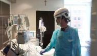 A nurse works in a COVID-19 patient's room during a tour of SSM Health St. Anthony Hospital's intensive care unit (ICU) amid the coronavirus disease (COVID-19) pandemic in Oklahoma City, Oklahoma, US, on August 24, 2021.  File Photo / Reuters
