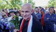 File Photo: Belarusian human rights activist Ales Byalyatski meets with journalists and his supporters, after he was released from prison and arrived at a railway station in Minsk, Belarus, June 21, 2014. (REUTERS/Marina Serebryakova)