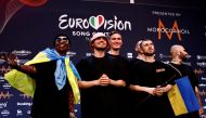 File Photo: Kalush Orchestra from Ukraine pose for photographers after winning the 2022 Eurovision Song Contest, in Turin, Italy, May 15, 2022. (REUTERS/Yara Nardi)