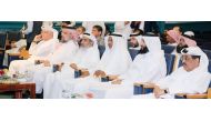 Minister of Awqaf and Islamic Affairs H E Ghanem bin Shaheen bin Ghanem Al Ghanem (fourth right) during the Nations Seminar that took place at the Abdullah Bin Zaid Al Mahmoud Islamic Cultural Centre on Thursday.