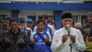 Former football player Persib FC attends a prayer for the victims of a riot and stampede at Kanjuruhan Stadium at Sidolig stadium in Bandung, West Java province, Indonesia, October 7, 2022, in this photo taken by Antara Foto. Antara Foto/Raisan Al Farisi/via Reuters